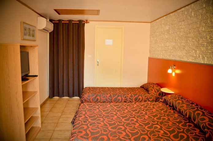 Imagen de la habitación del Hotel Les Pins. Foto 9