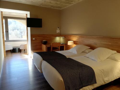 Imagen de la habitación del Hotel Les Planes del Grau. Foto 7