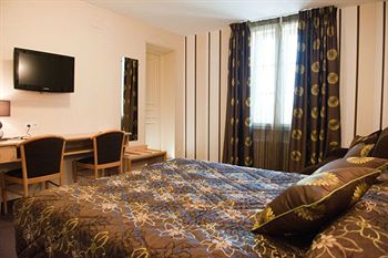 Imagen de la habitación del Hotel Les Platanes. Foto 9