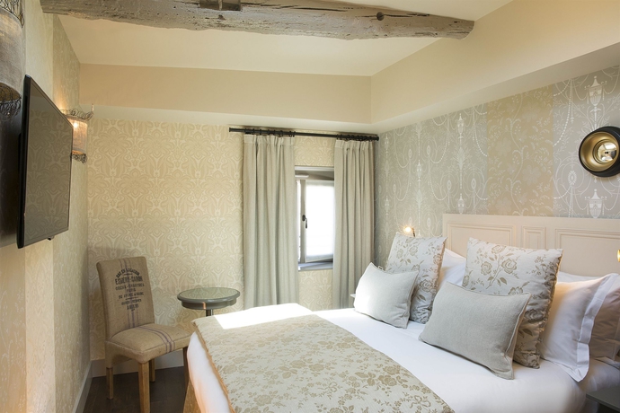 Imagen de la habitación del Hotel Les Plumes. Foto 11