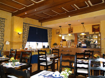 Imagen de la habitación del Hotel Les Reflets Jaunes. Foto 9