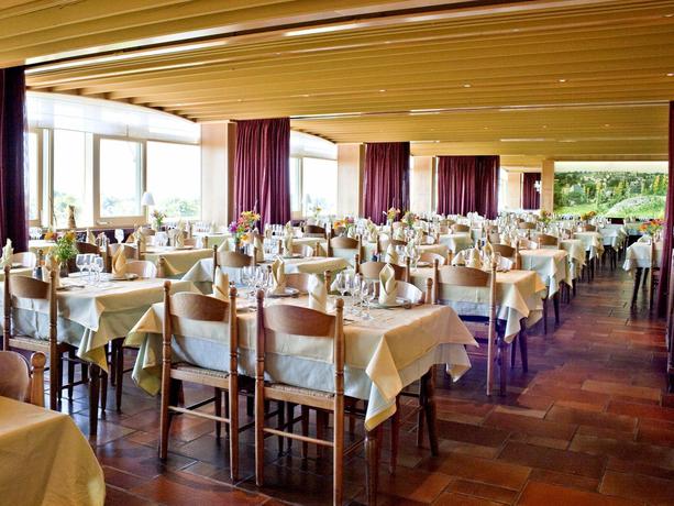 Imagen del bar/restaurante del Hotel Les Remparts, Salers. Foto 2