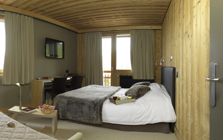 Imagen de la habitación del Hotel Les Rhodos. Foto 10