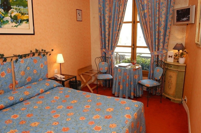 Imagen de la habitación del Hotel Les Rives De Notre Dame. Foto 6