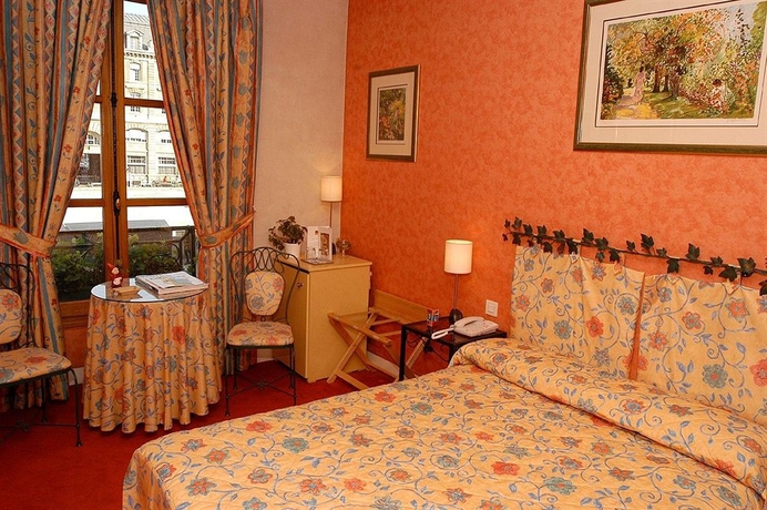 Imagen de la habitación del Hotel Les Rives De Notre Dame. Foto 8