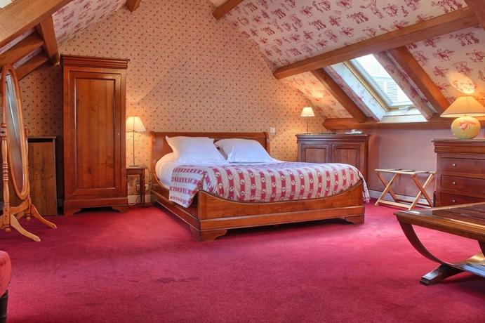 Imagen de la habitación del Hotel Les Rives De Notre Dame. Foto 11