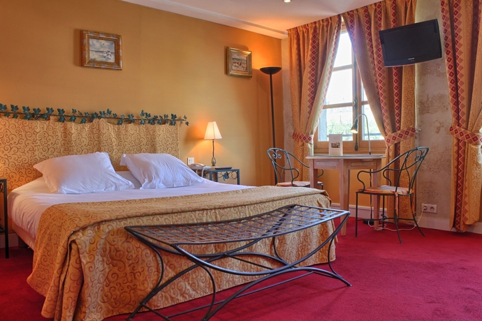 Imagen de la habitación del Hotel Les Rives De Notre Dame. Foto 12