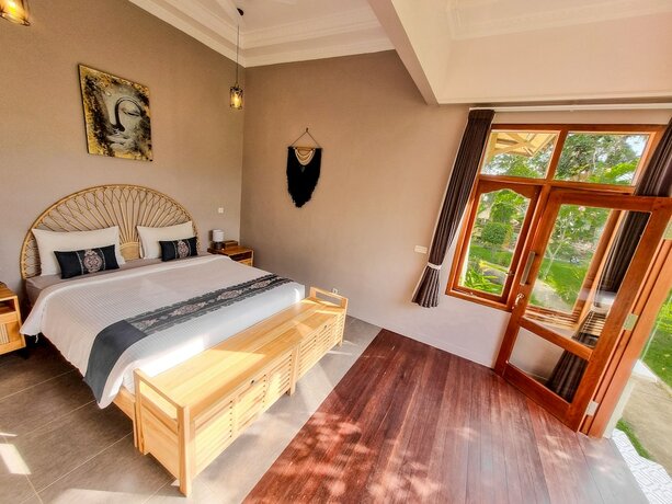 Imagen de la habitación del Hotel Les Rizieres Lombok. Foto 14