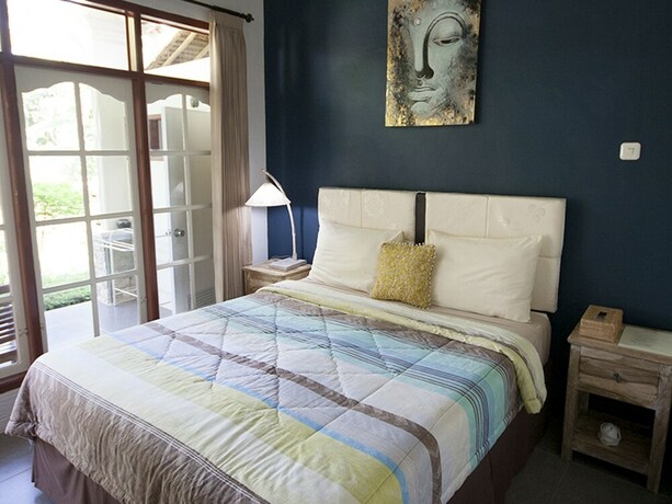 Imagen de la habitación del Hotel Les Rizieres Lombok. Foto 18