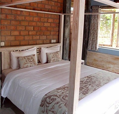 Imagen de la habitación del Hotel Les Rizieres Lombok. Foto 21