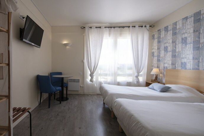 Imagen de la habitación del Hotel Les Rocailles. Foto 13