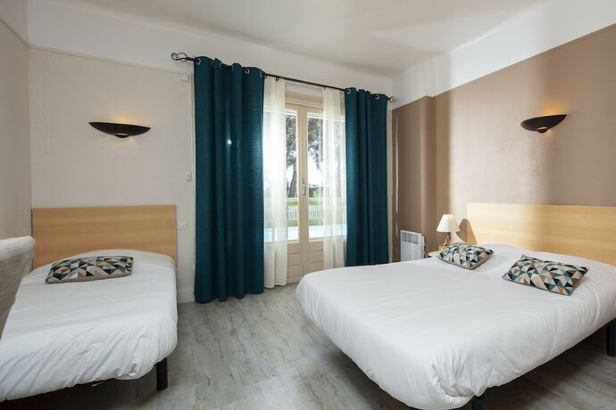 Imagen de la habitación del Hotel Les Rocailles. Foto 17