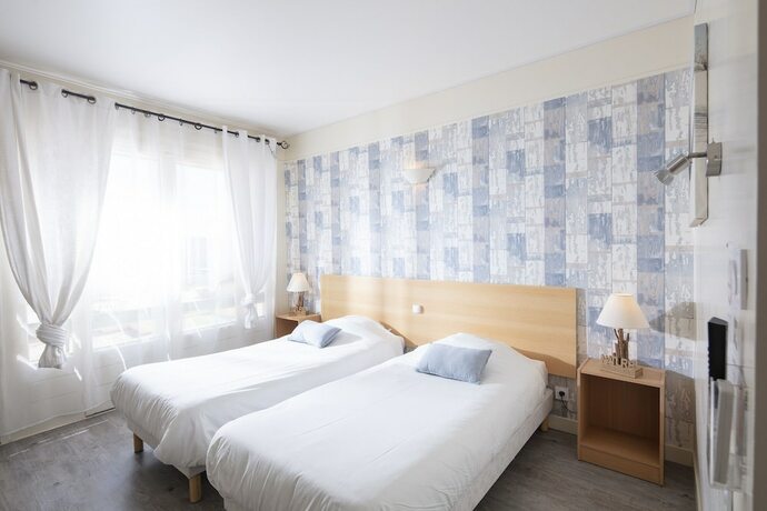 Imagen de la habitación del Hotel Les Rocailles. Foto 19