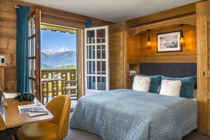 Imagen de la habitación del Hotel Les Roches Fleuries. Foto 5