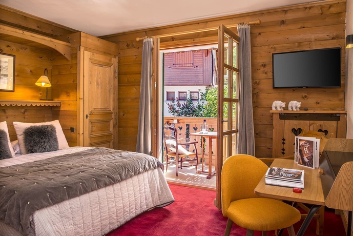 Imagen de la habitación del Hotel Les Roches Fleuries. Foto 8