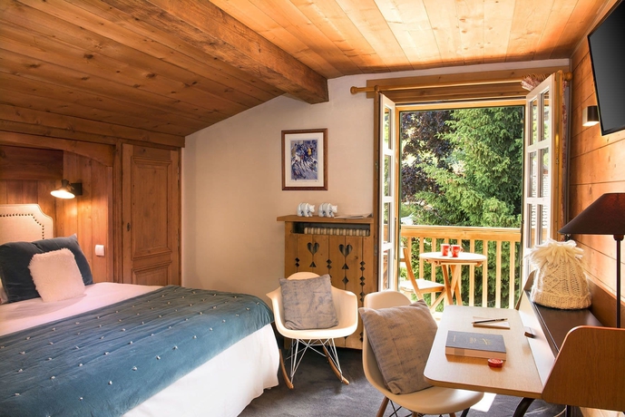 Imagen de la habitación del Hotel Les Roches Fleuries. Foto 9