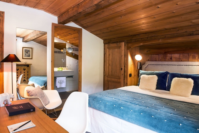 Imagen de la habitación del Hotel Les Roches Fleuries. Foto 10