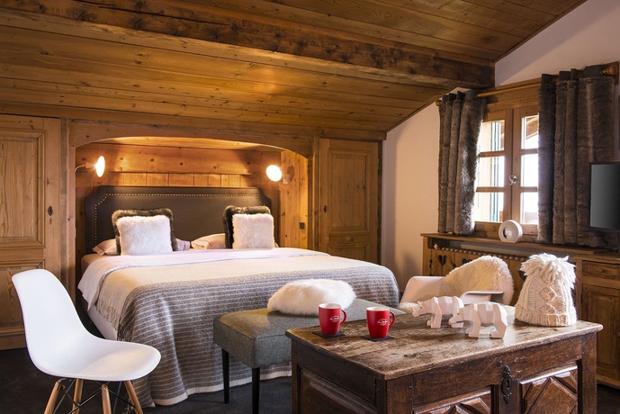 Imagen de la habitación del Hotel Les Roches Fleuries. Foto 12