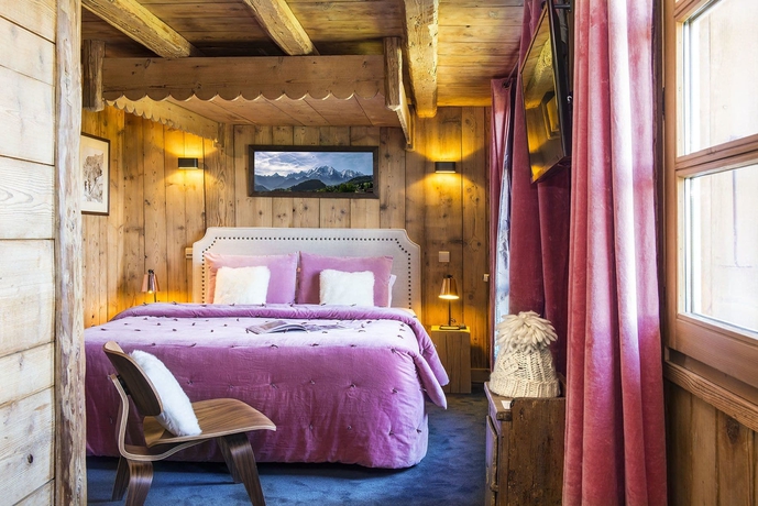 Imagen de la habitación del Hotel Les Roches Fleuries. Foto 17