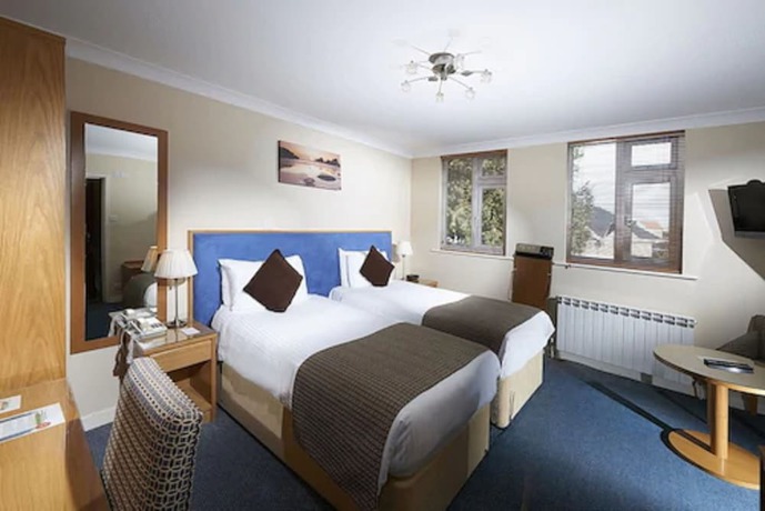 Imagen de la habitación del Hotel Les Rocquettes. Foto 12