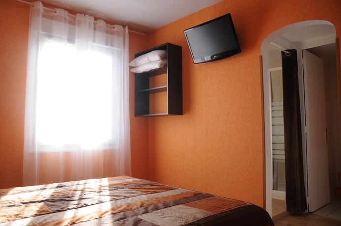Imagen de la habitación del Hotel Les Rosiers. Foto 14
