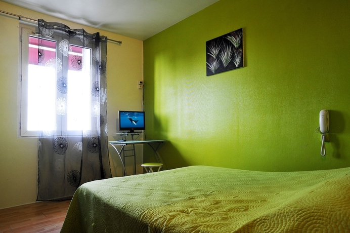 Imagen de la habitación del Hotel Les Rosiers. Foto 15