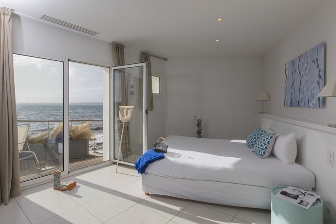 Imagen de la habitación del Hotel Les Sables Blancs. Foto 9