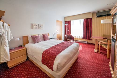 Imagen de la habitación del Hotel Les Suites De Laviolette Ascend Collection. Foto 16