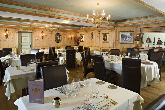 Imagen del bar/restaurante del Hotel Les Suites Du Montana By Les Etincelles. Foto 2