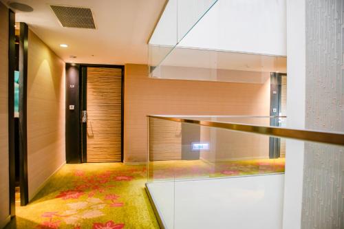 Imagen de la habitación del Hotel Les Suites Grandee Taipei. Foto 7