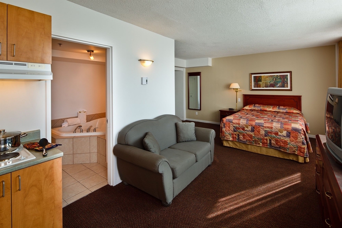 Imagen de la habitación del Hotel Les Suites Labelle. Foto 3