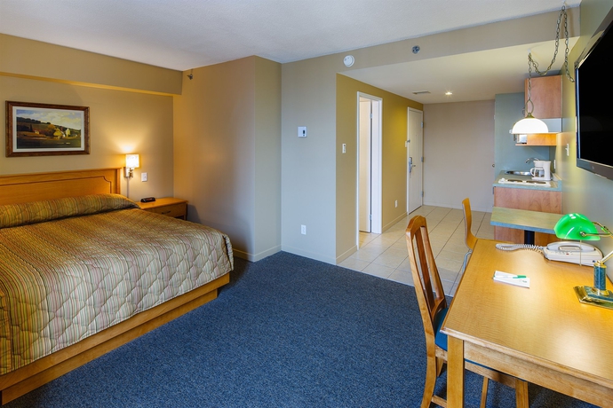 Imagen de la habitación del Hotel Les Suites Labelle. Foto 5