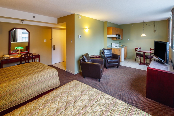 Imagen de la habitación del Hotel Les Suites Labelle. Foto 8