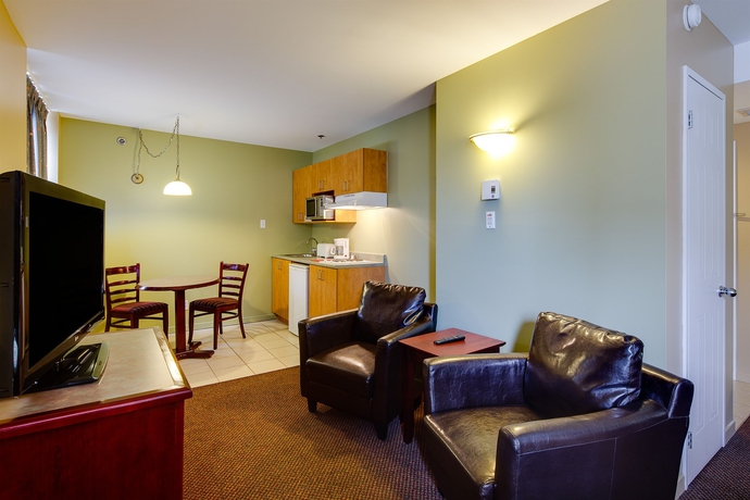 Imagen de la habitación del Hotel Les Suites Labelle. Foto 9