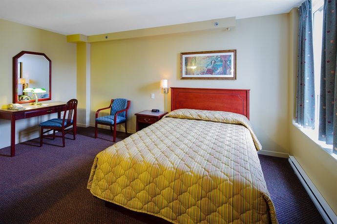 Imagen de la habitación del Hotel Les Suites Labelle. Foto 11