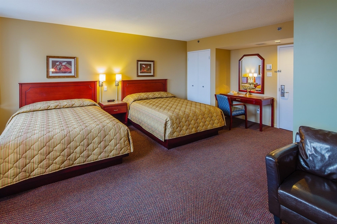 Imagen de la habitación del Hotel Les Suites Labelle. Foto 12