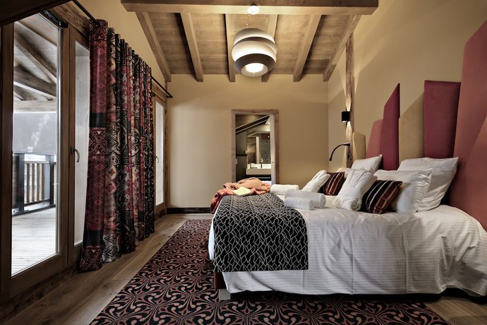 Imagen de la habitación del Hotel Les Suites d'Alexane. Foto 4