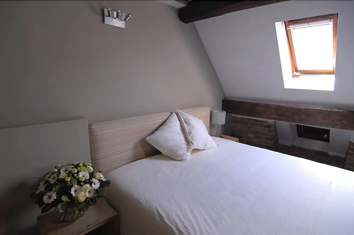 Imagen de la habitación del Hotel Les Tanneurs De Namur. Foto 15