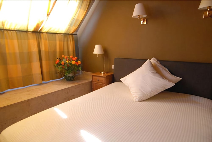 Imagen de la habitación del Hotel Les Tanneurs De Namur. Foto 17