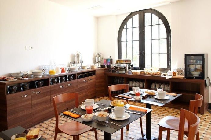 Imagen de la habitación del Hotel Les Terrasses Du Bailli. Foto 4