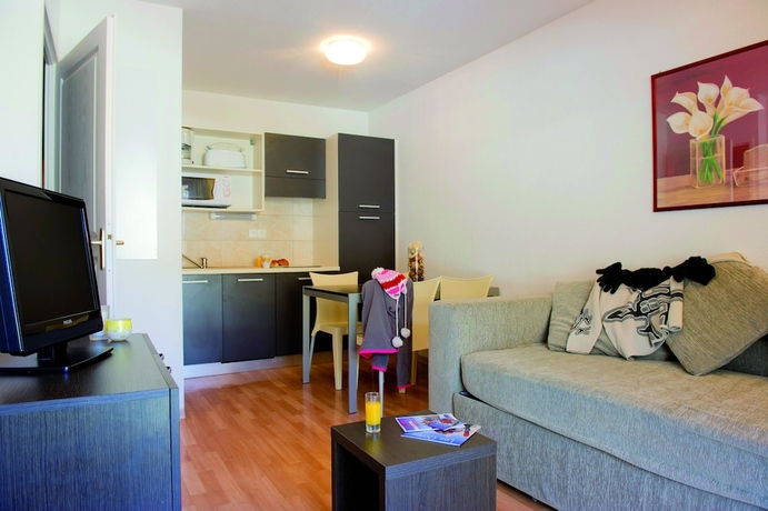 Imagen de la habitación del Hotel Les Terrasses Du Soleil D'or. Foto 11
