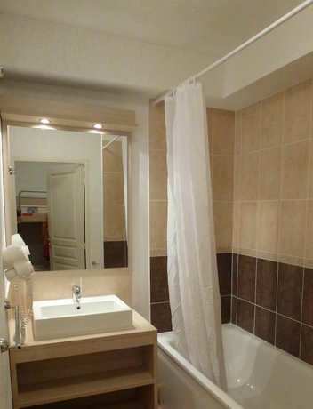 Imagen de la habitación del Hotel Les Terrasses Du Soleil D'or. Foto 13