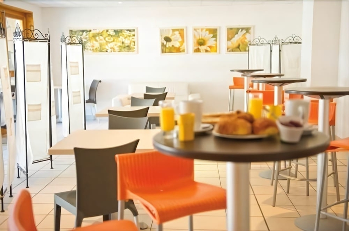 Imagen del bar/restaurante del Hotel Les Terrasses Du Soleil D'or. Foto 5