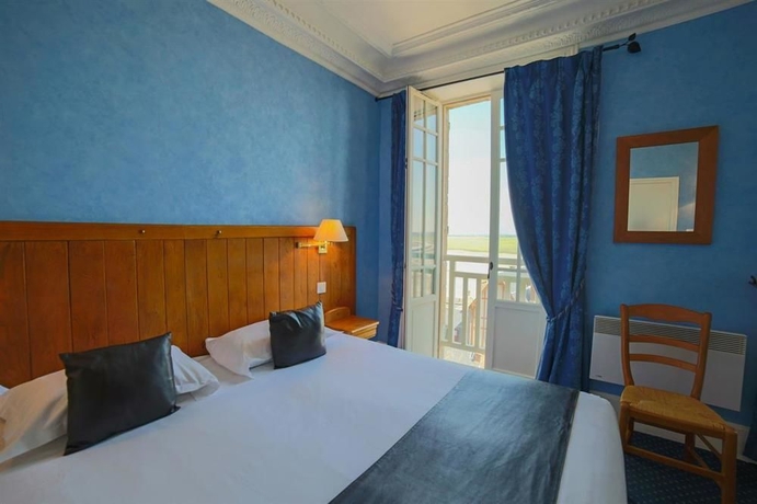 Imagen de la habitación del Hotel Les Terrasses Poulard. Foto 9