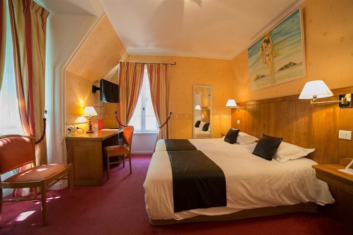 Imagen de la habitación del Hotel Les Terrasses Poulard. Foto 10