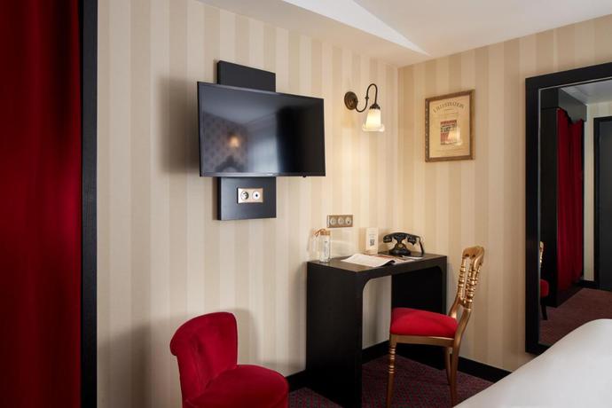 Imagen de la habitación del Hotel Les Theatres. Foto 7