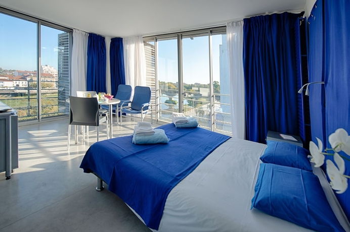 Imagen de la habitación del Hotel Les Thermes. Foto 8