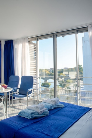 Imagen de la habitación del Hotel Les Thermes. Foto 9