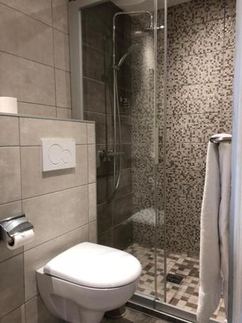 Imagen de la habitación del Hotel Les Tilleuls. Foto 8