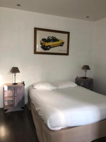 Imagen de la habitación del Hotel Les Tilleuls. Foto 9